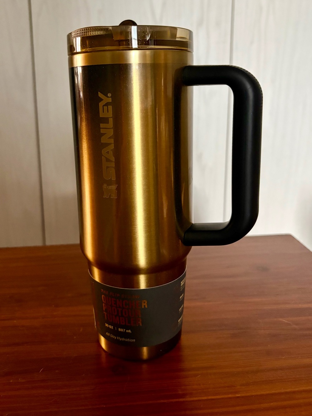Stanley Gold Travel Mug with Black Handle and Lid